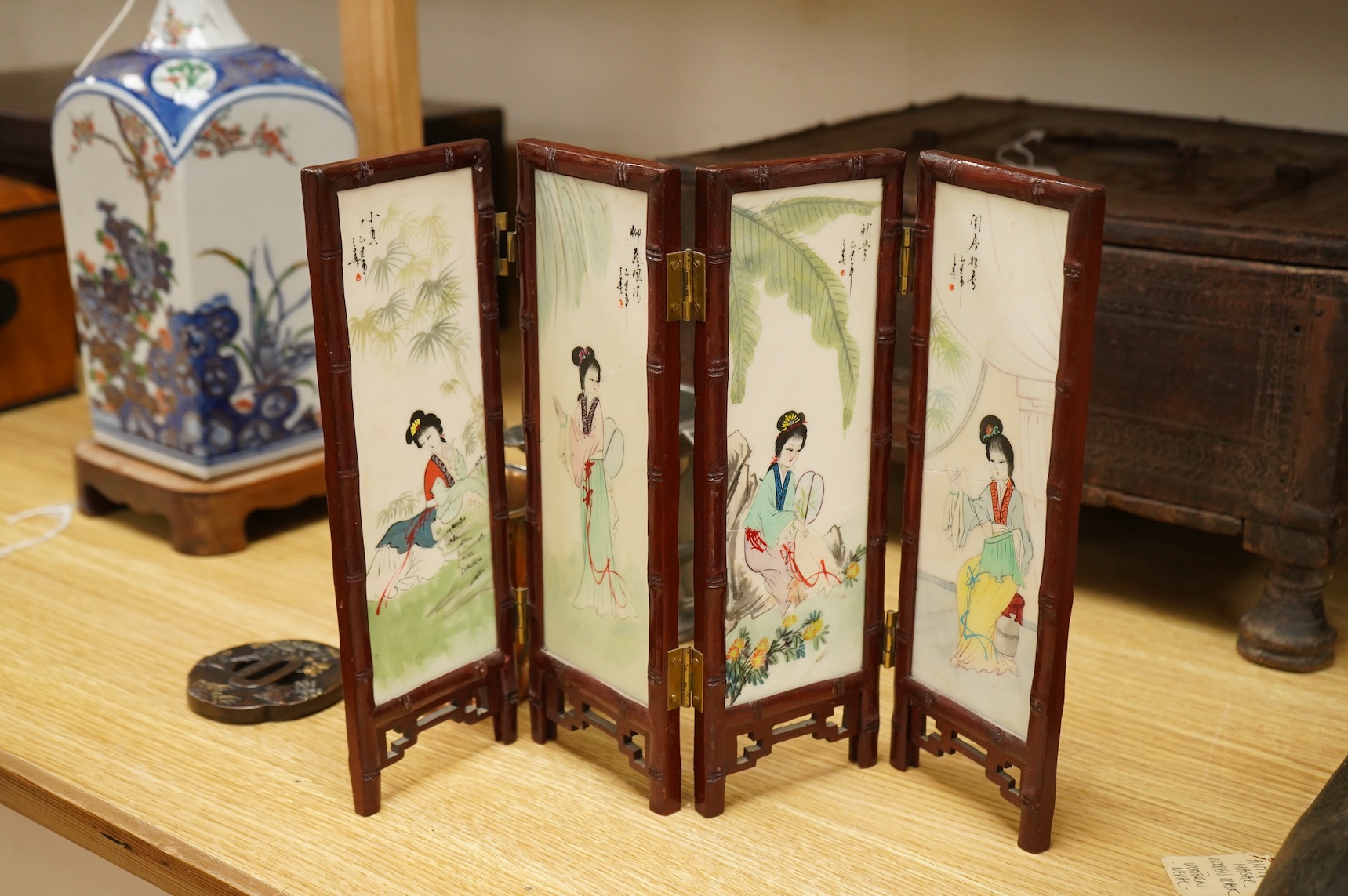 A Chinese cloisonné enamel ‘dragon’ jar and cover, a Chinese miniature four-fold table screen, two metalware tankards and a reproduction Japanese tsuba, cloisonne jar 9cm